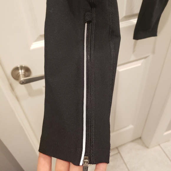 NIKE Dri-Fit Pants with Side Zipper and Reflector - Picture 2 of 3